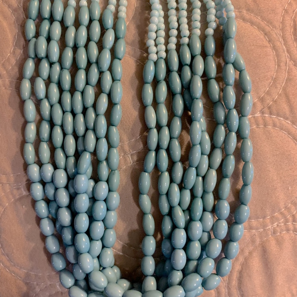 1946 turquoise color mulitistrand beaded necklace.